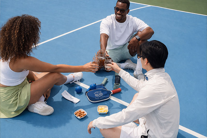Nobilo Event people playing pickleball and enjoying wine at Nobilo event
